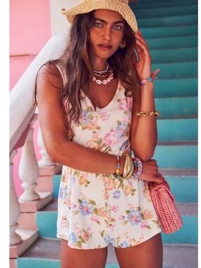 Floral V-Neck Summer Romper in Pink. New without tags, never worn.